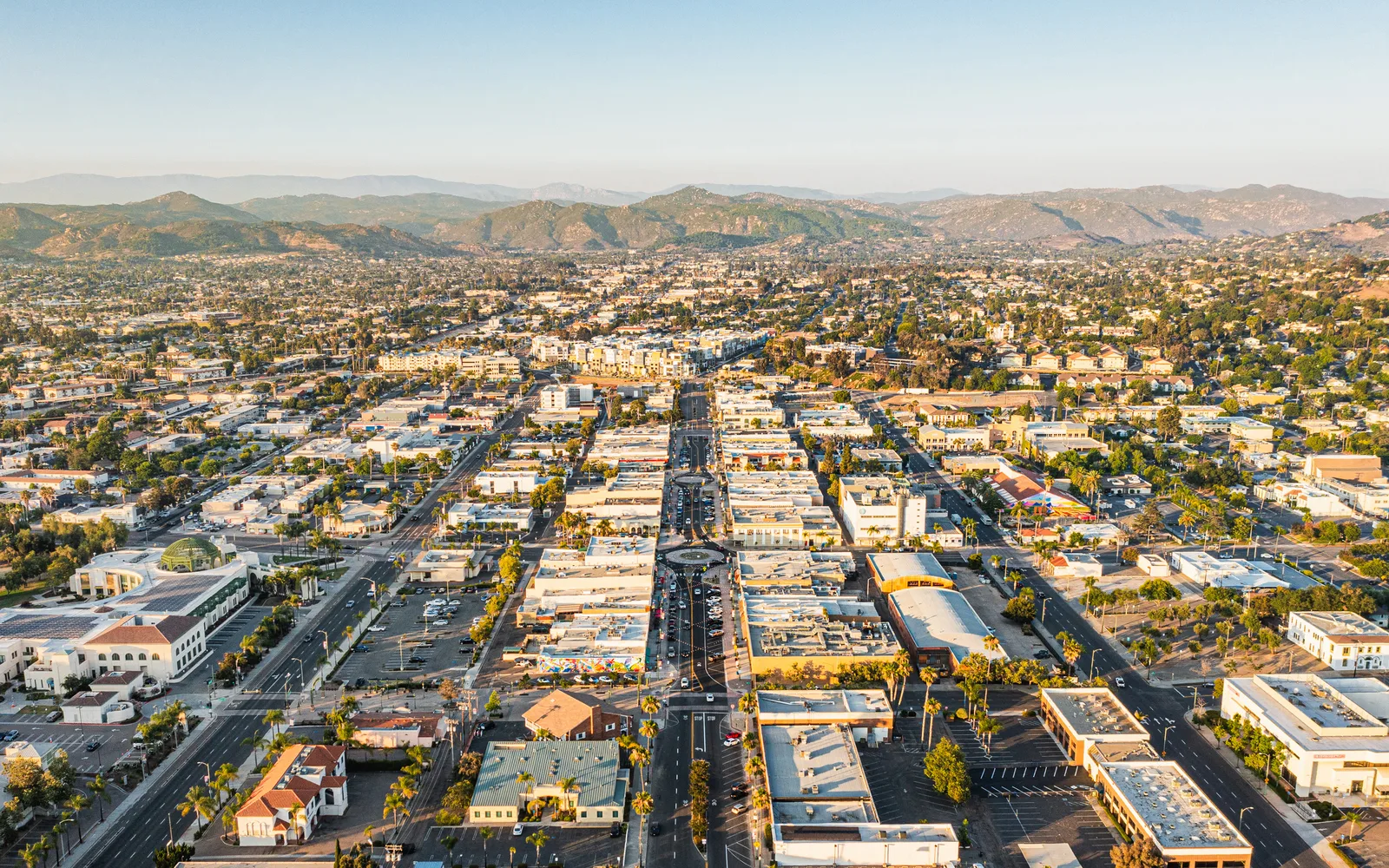 Aerial view of Historic Downtown Escondido's Grand Avenue with shops, restaurants, and City Hall