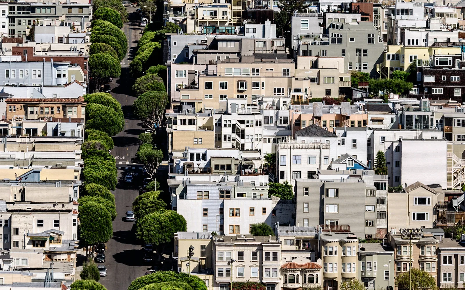 Residential buildings along a California road showing typical suburban architecture and street character